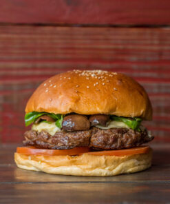 39 - Hamburguesa con Queso, Rúcula, Tomate confitado, y Cebolla caramelizada